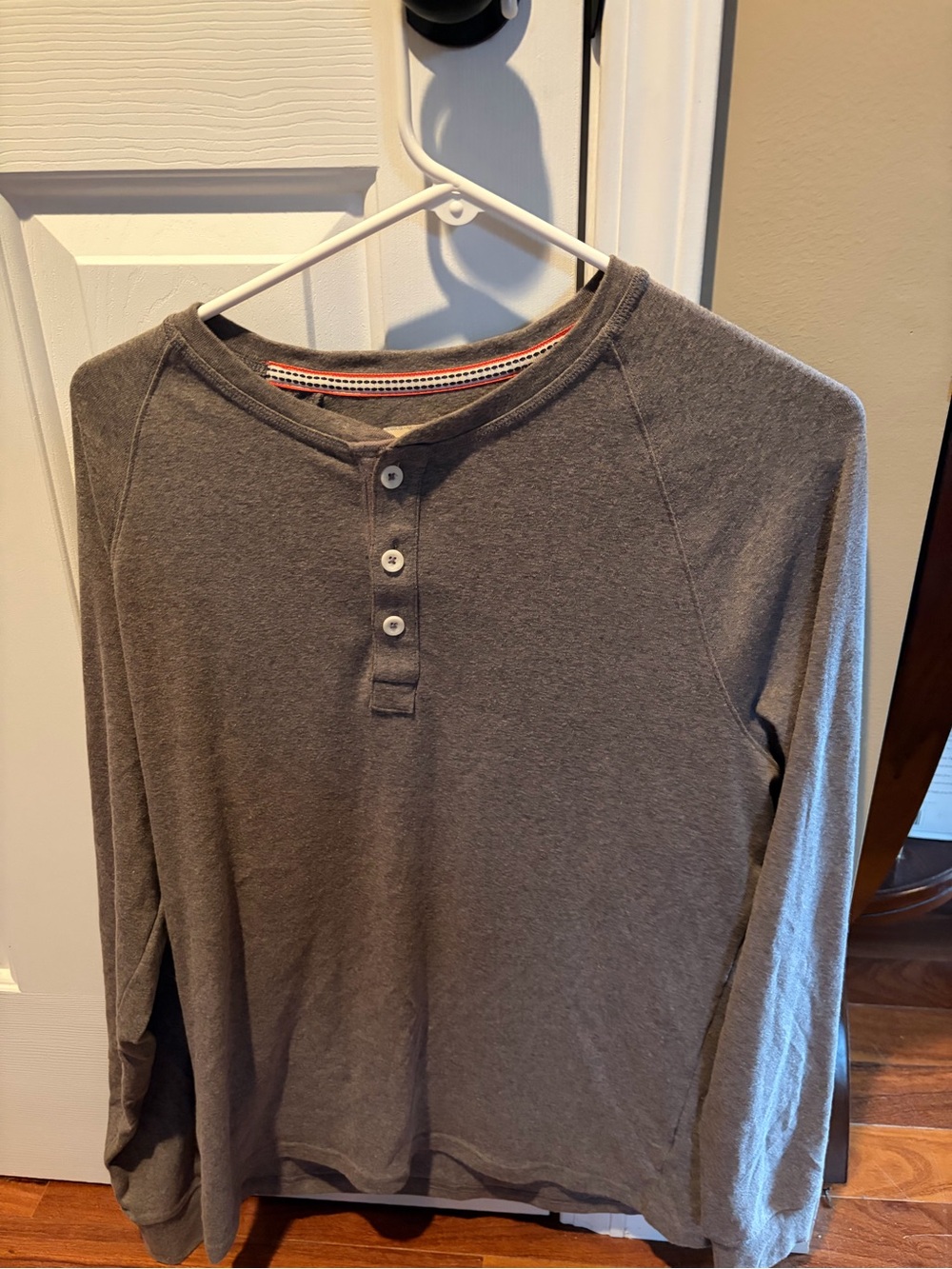 The Normal Brand Men’s Puremeso Henley in Heather Grey.